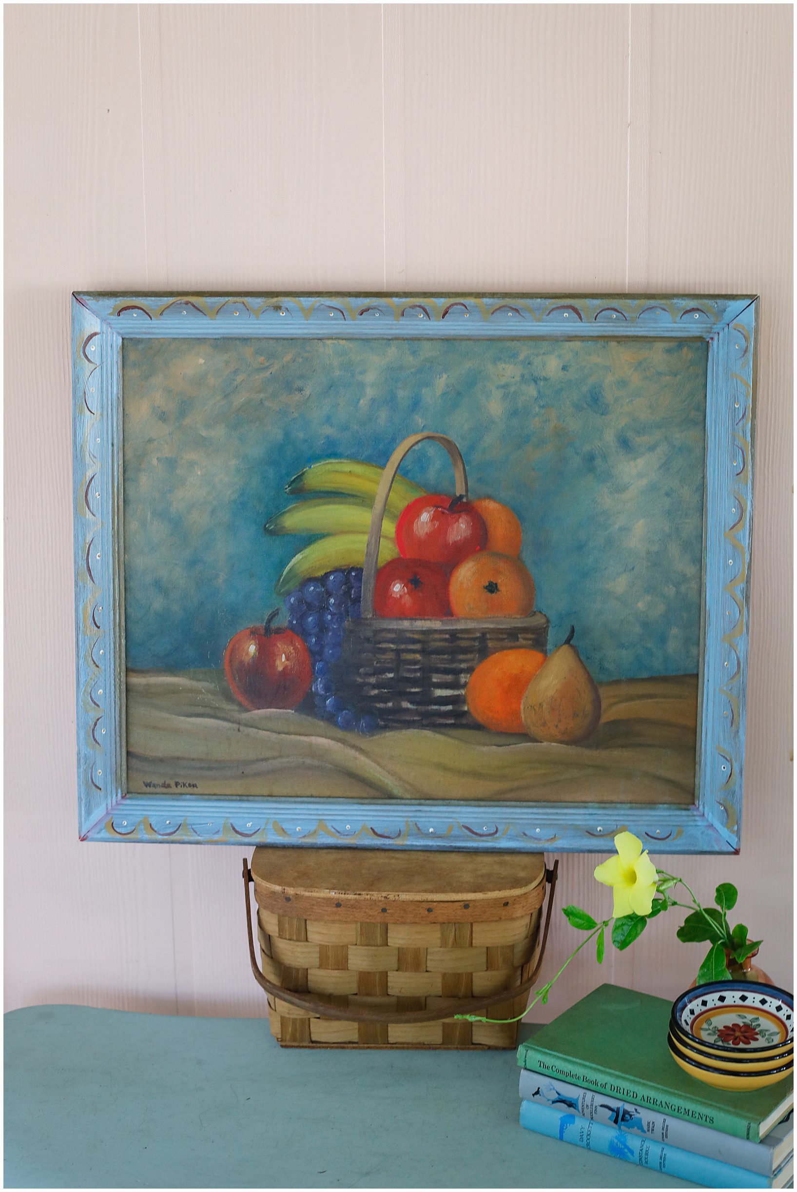 hand painted frame around a painting of fruit